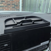 EDBETOS front view installed behind screen showing tidy storage benefit