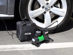EPAuto inflator in use on car tire demonstrating quick roadside inflation benefit