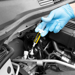 ERRECOM dye glowing under UV revealing bright leak detection benefit