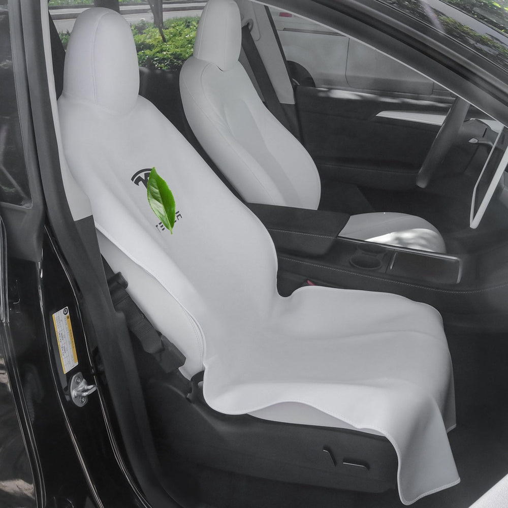 EVMODS full front seat protector fitted on Tesla Model Y preventing spills