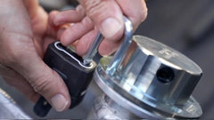 Flow Security Systems valve detail showing built-in pressure relief for safe tank venting