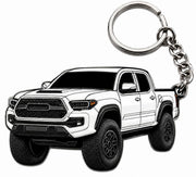 FOUR WHEEL BEAST front view of white Tacoma keychain shows truck styling and durable finish