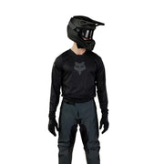 Fox Racing 180 Blackout front view showing sleek black profile and fit benefit