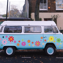 Fuutreo daisy decals applied to car bumper adding playful color