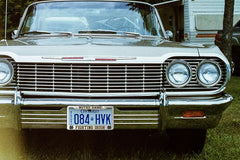 Generic Notre Dame frame installed on a car front and rear, provides polished team display
