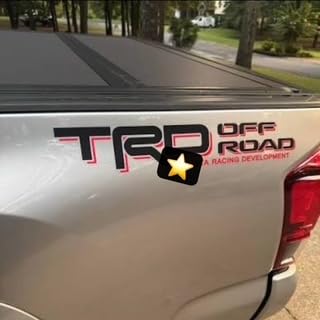 GO-GO.GROUP decal front view on bedside showing matte black and red 4x4 for bold style