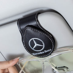 GshionLyfe front view on visor showing secure sunglass holding benefit
