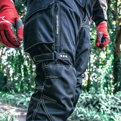 HWK Motorsports Apparel close-up of knee armor pocket showing removable CE protection and correct placement