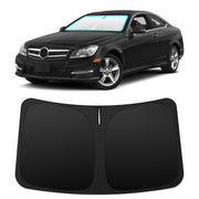 INSAUTO front view fitted on Mercedes C-Class windshield showing perfect fit and sun blockage