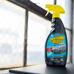 Invisible Glass spraying windshield to remove road film for clearer view