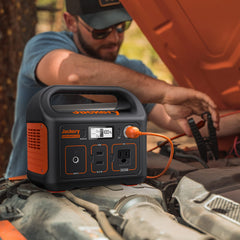 Jackery cable in use in car cigarette lighter, fast on-the-go power top-up benefit