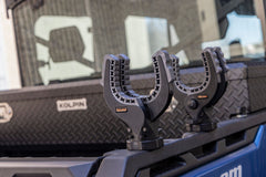 Kolpin grips mounted on a Can-Am rack illustrating LinQ-compatible secure attachment