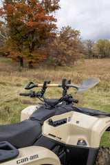 Kolpin Rhino Grip XL mounted on ATV handlebar demonstrating secure transport