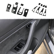 Korlot front driver door panel trim showing carbon finish and refined look