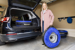 Kurgo Michelin 80 being carried by person showing hands and clothes stay clean benefit