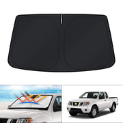 KUST front view installed on Nissan Frontier blocking sunlight and protecting dash