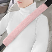 LACDL front view of pink seatbelt cover showing plush finish and brand