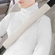 LACDL front view of off-white seatbelt cover showing soft plush finish and style benefit