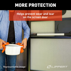 Lippert Components Screen Assist being used while carrying groceries for hands-free exit