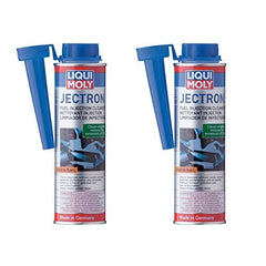 Product being poured into petrol tank near filler cap, Liqui Moly cleaner improving fuel quality