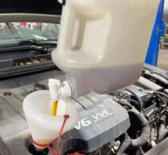 Lisle 19602 close-up of shut-off valve demonstrating controlled drip-free pouring advantage