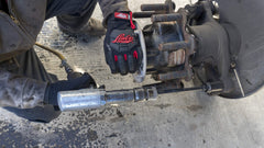 Lisle 29090 in use on truck anchor pin, speeds bushing removal safely