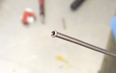 Lisle 33260 being used on a vehicle brake line demonstrating space-saving benefit