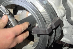 Lisle 59560 in use on GM A/C pulley demonstrating faster, safer belt fitment