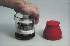 Lisle Handy Packer in use with bearing on piston, faster grease packing benefit