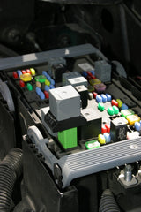 Lisle jumper inserted into relay socket demonstrating hands-on testing and safer diagnostics