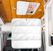 Living in a Bubble front view showing clean white vent cover and benefit of light blocking