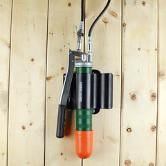 LockNLube installed on work truck wall preventing tool movement in transit