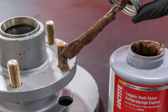 Loctite paste on spark plug threads preventing seizure and aiding removal