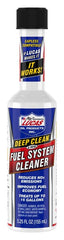 Applying Lucas Oil cleaner into fuel tank with funnel demonstrating easy maintenance