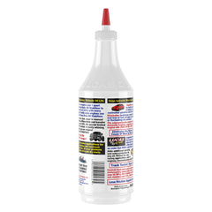 Lucas Oil being poured from bottle closeup showing easy application and dose control