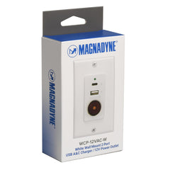 Magnadyne next to smartphone to show compact size and practical footprint