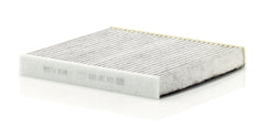 MANN-FILTER activated carbon layer close-up highlighting gas adsorption benefit