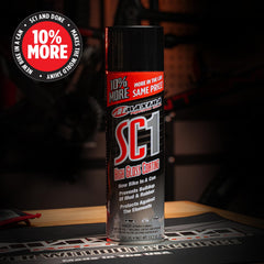 Maxima SC1 being sprayed on swingarm close-up, demonstrating easy application and shine