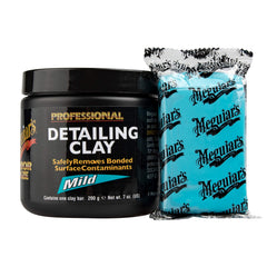 Meguiar's clay puck close-up revealing texture and pliability for safe contaminant removal