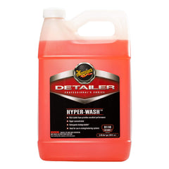 Meguiar's pouring concentrate into a measuring cup for correct dilution and savings