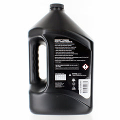 Mercury Premium Plus being added to an outboard motor for protection