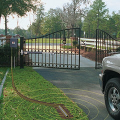 Mighty Mule installed probe beside driveway showing hands-free gate exit