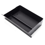 Moonlinks front view of Tesla center console drawer showing neat storage benefit