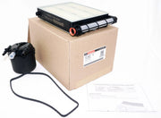 Motorcraft fuel filter front view showing compact housing and inlet outlets, aiding easy replacement