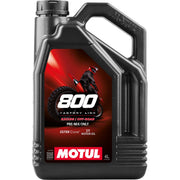 Motul 800-2T bottle front label showing product identity and benefits