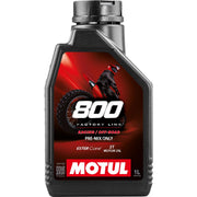 Motul 800-2T front packaging showing 1 L bottle and label benefits