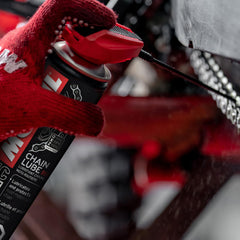 Motul C2 before-and-after chain comparison showing reduced corrosion and cleaner links