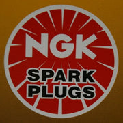 NGK DCPR7E front packaging showing four-pack and authentic branding for easy identification and confidence