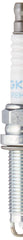 NGK closeup on iridium electrode tip highlighting fine diameter for improved spark