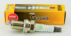 NGK spark plug close-up showing top electrode detail for reliable spark